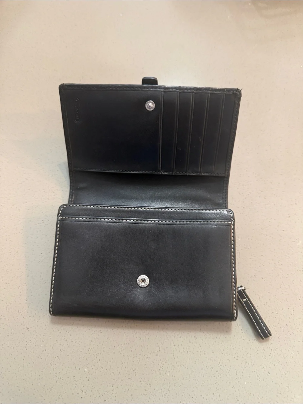 Coach Black Leather Wallet with White Stitching and Buckle